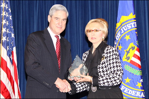Martha Deaver Receiving FBI Director's Award